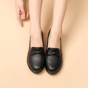 Mocasines cómodos de cuero auténtico negro para mujer con elegante detalle de lazo