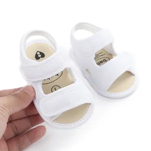 Close-up macro view of white breathable mesh summer sandals for infants and toddlers