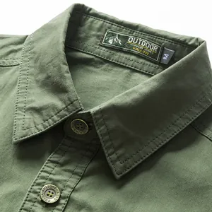 Detailed view of men's olive green pure cotton cargo shirt collar and engraved buttons