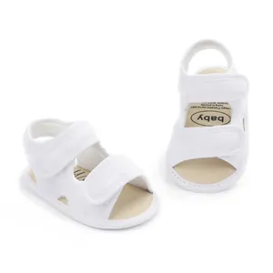 Breathable white mesh baby sandals with dual velcro straps for infant summer wear