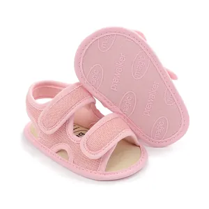 Detail of pink baby pre-walker sandals showing the textured sole and mesh upper.