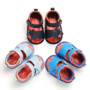 Collection view of baby walking sandals featuring colorful shark designs and soft soles