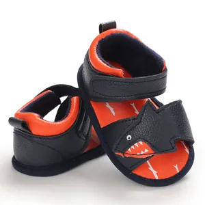 Detail view of cartoon shark baby sandals with soft soles for summer infant walking