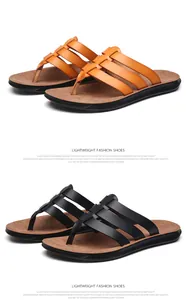 Detailed view of men's summer leather flip-flops in black and brown colors for beach