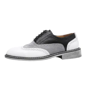 Vue détaillée de profil des chaussures richelieu tricolores en cuir pour hommes