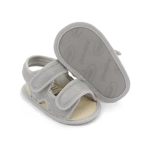 Soft grey mesh baby sandals featuring a non-slip sole and Velcro straps for toddlers