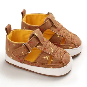 Detail of baby soft sole canvas sandals with hook and loop closure