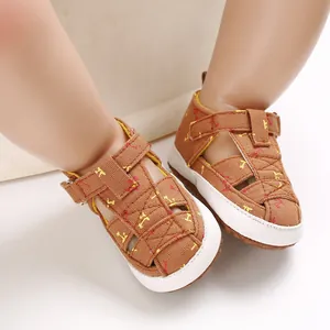 Close-up of brown baby cotton sandals with soft non-slip soles for toddlers