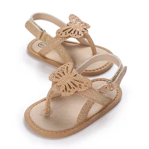 Glittery golden baby sandals with hollow butterfly detail and soft sole for newborns