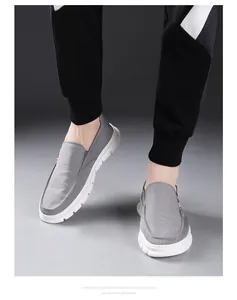 Men's grey casual slip-on loafers featuring thick white anti-skid EVA foam bottoms