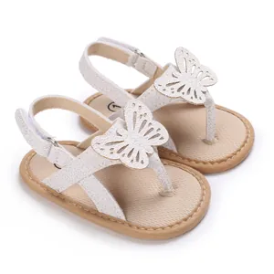 White butterfly baby walker sandals with soft soles and breathable T-strap design.