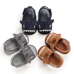Detailed view of soft-sole baby walking shoes with cute 3D cartoon shark design