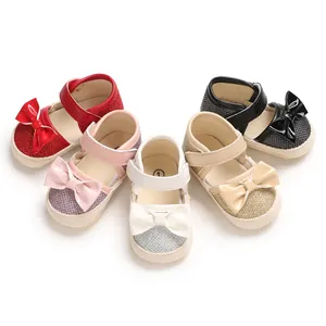 Multiple colors of soft-sole baby princess shoes with sparkly bow details for infants