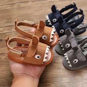 Cute shark-themed baby walking sandals with soft soles and breathable canvas material