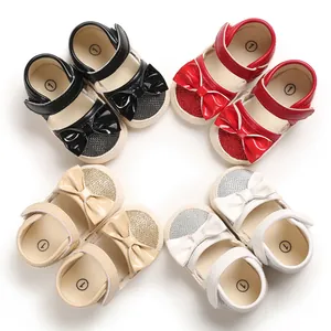 Close-up of baby princess walking shoes in four colors with adorable bow accents