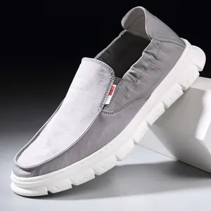 Lightweight grey men's slip-on casual shoes with breathable fabric and soft sole