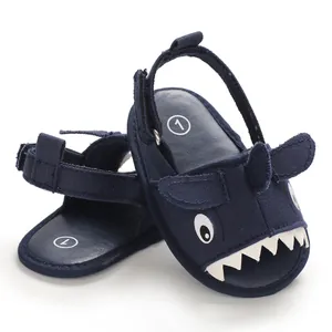 Navy blue baby walker sandals featuring a cute shark cartoon design and soft soles