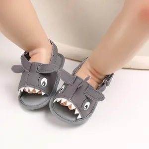 Close-up of grey cartoon shark baby sandals with soft breathable canvas material