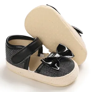Black baby girl walker shoes with soft sole and bow accent, perfect for 0-1 year infants.
