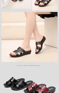 Detail of comfortable leather flat sandals for elderly women in black and burgundy colors