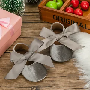 Elegant grey velvet baby princess shoes with large satin ribbons and soft flexible soles