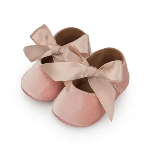 Soft pink velvet baby princess walker shoes featuring elegant champagne silk ribbon bows