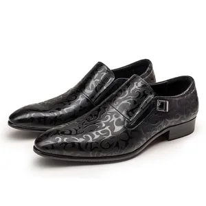 Detailed view showing the intricate embossed pattern on black leather mens dress shoes