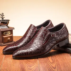 Stylish embossed men's leather dress shoes with buckle detail in elegant burgundy finish.