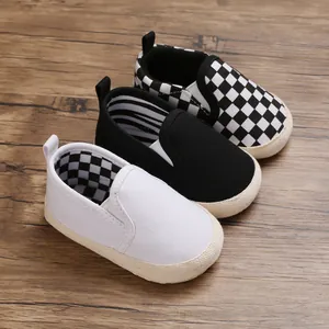 Soft sole canvas baby walker shoes for infants in white, black and checkered patterns