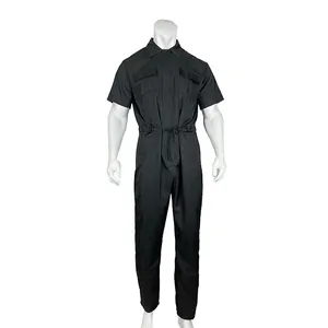 Front view detail of a black men's short-sleeved workwear jumpsuit with drawstring waist