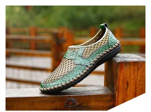 Detailed view of breathable green mesh loafers with crocodile texture for men's casual wear