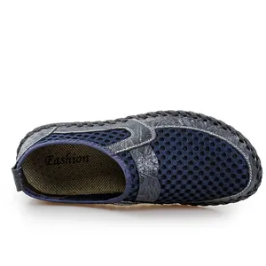 Breathable navy blue mesh slip-on loafers for men with textured faux leather detailing