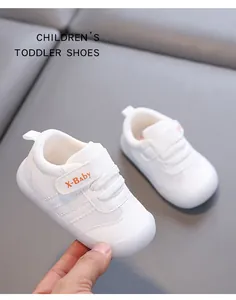 White breathable mesh toddler walking shoes with velcro strap and soft rubber sole