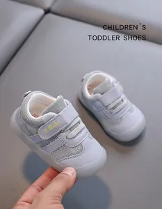 Close-up detail of breathable mesh toddler shoes with a convenient velcro strap design.