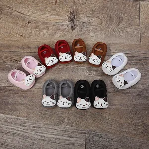 Display of multiple colors of cartoon cat plush baby walking shoes for 0-1 year olds