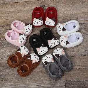 Close-up detail of soft plush texture and cartoon cat design on baby walker shoes