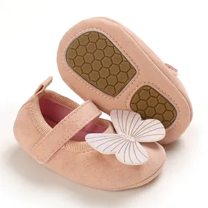Soft-sole non-slip baby girl walking shoes in pink suede with decorative butterfly