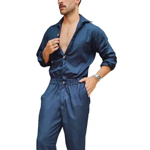 Detailed close-up of a navy blue long-sleeved men's jumpsuit with button-up front closure