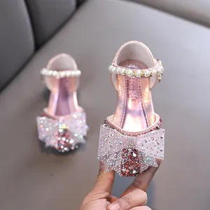 Funkelnde rosa Prinzessinnenschuhe für Mädchen mit großer Strass-Schleife und Perlen