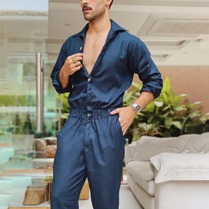 Modern navy blue men's long sleeve jumpsuit featuring a collared button-down front