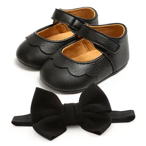 High-quality black PU leather baby Mary Jane shoes set with matching bow headband detail