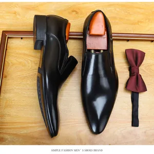 Classic black pointed toe men's formal dress shoes with stylish bow tie accessory