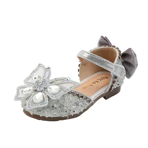 Sparkling silver girl's princess sandals with rhinestone butterfly and grey bow detail.