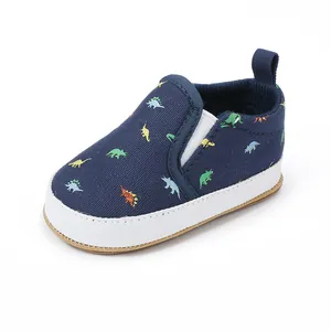 Donkerblauwe canvas instapschoenen voor baby's met kleurrijke dinosauruspatronen en witte zool