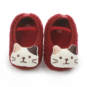 Cozy red plush baby walking shoes with cute cat face embroidery for infants