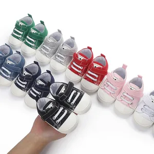 Chaussures en toile colorées pour bébé de 0 à 1 an avec semelles en caoutchouc