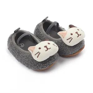 Detailed view of soft grey baby walking shoes with cute plush cartoon cat face decor