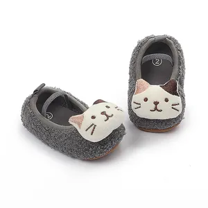 Soft grey fuzzy baby walker shoes featuring a cute cartoon cat face detail for infants