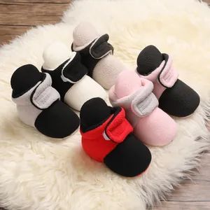 Cozy soft sole fleece baby boots in assorted color block styles for newborn infants