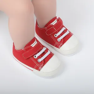 Chaussures de marche en toile rouge avec bout en caoutchouc pour bébés de 0 à 1 an